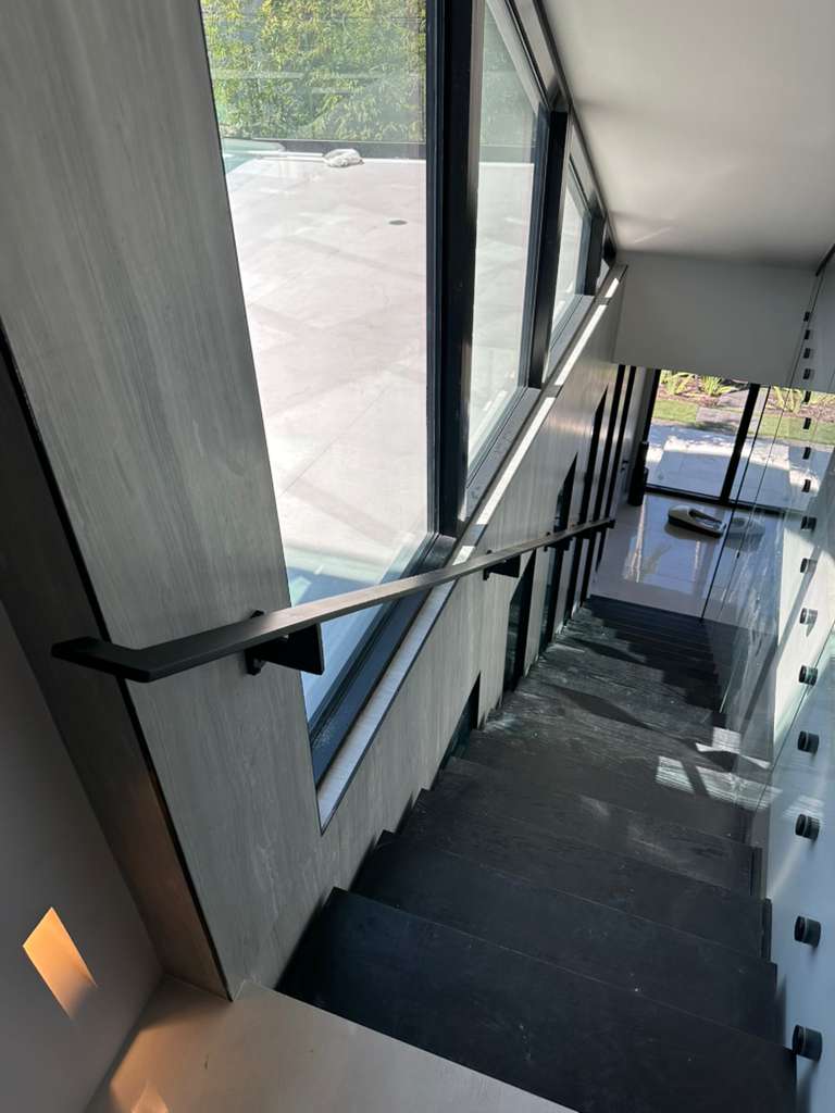 Fine Edge Industries van upfitting, welding custom shelving inside work van